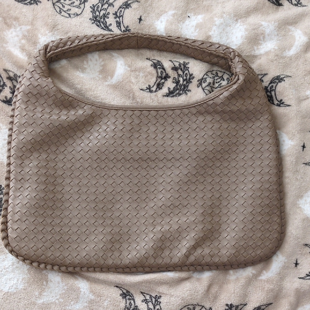 taupe-colored woven faux leather hobo bag.